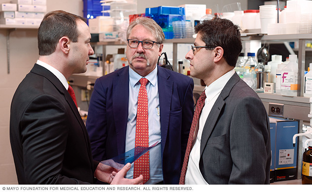 Members of the pancreatic cancer team discussing a patient