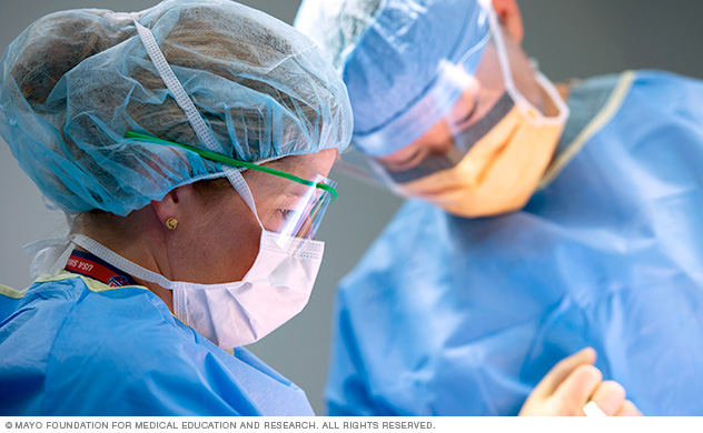 Surgeons working in an operating room