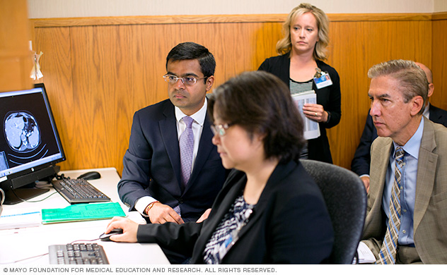 Photo shows doctors discussing treatment plans