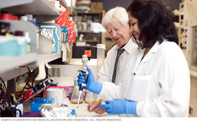 Photo shows researchers working in a lab