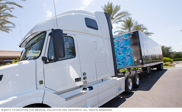 A semi tractor and trailer at site for an exam.