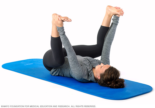 Happy baby yoga pose