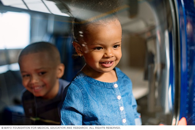 Two children smiling