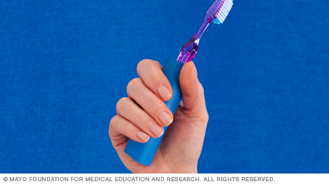 Toothbrush with a foam handle