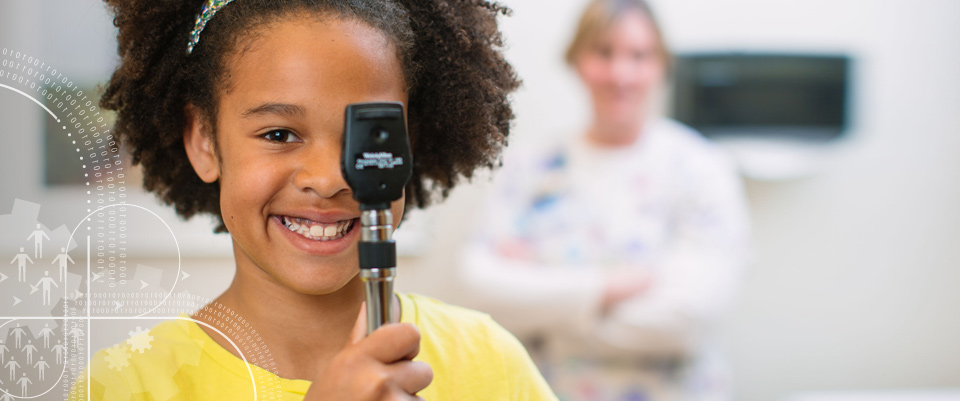 Photo of girl with an ophthalmoscope