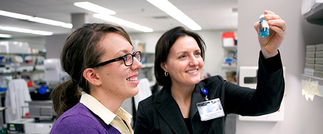 Jennifer J. Westendorf, Ph.D., of Mayo Clinic, and a lab colleague.