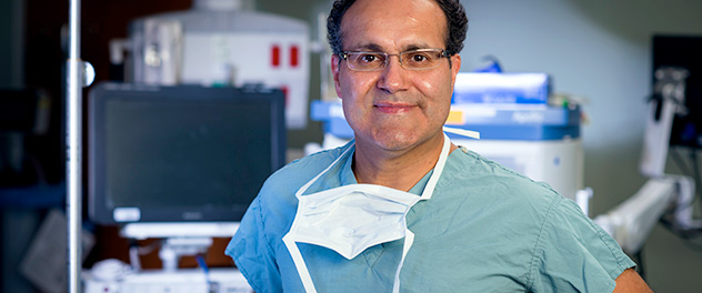 Alfredo Quinones-Hinojosa, M.D., in surgical garb