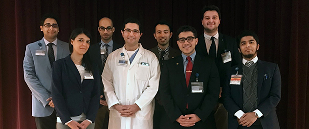 Trainee group shot features mentors, undergraduate research trainees, medical and high school students.