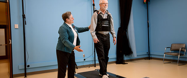 Picture of an older man walking on treadmill in the Motion Analysis Lab at Mayo Clinic.