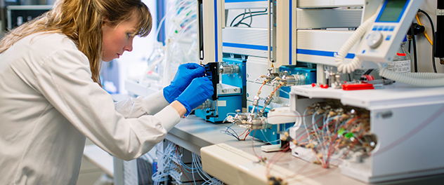 Person working with lab equipment