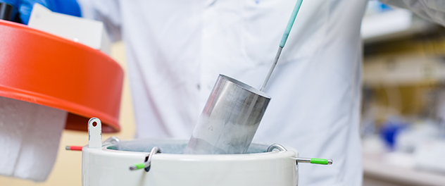 A researcher in Dr. Bydon's lab processes a sample.