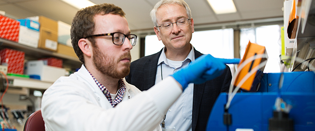 Department vice chair, Daniel J. Tschumperlin, Ph.D., reviewing findings with a research collaborator