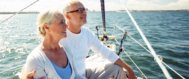 Senior couple on sailboat