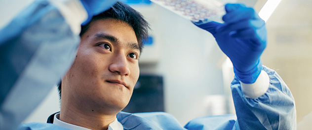 Photograph of a researcher working in a lab of the Cell Biology Program