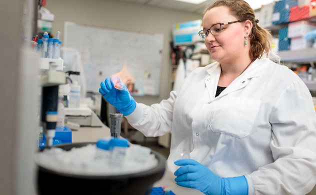 Trainee working in the lab