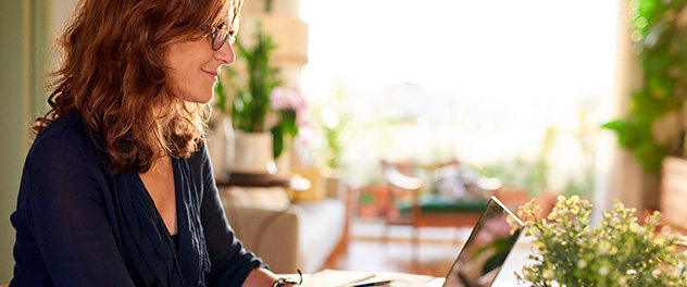 Woman typing on laptop