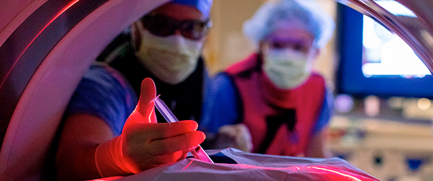 Radiologists performing a procedure