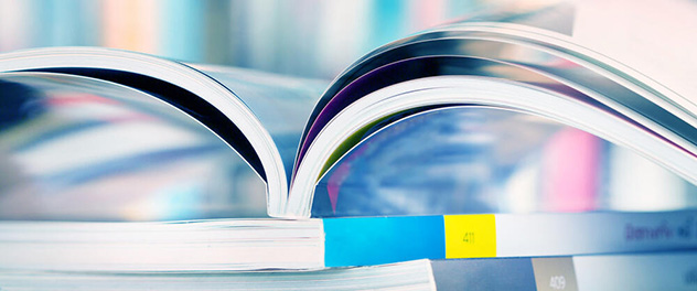 Image showing a stack of journals to depict a systematic review process to identify studies that answer a specific health care question