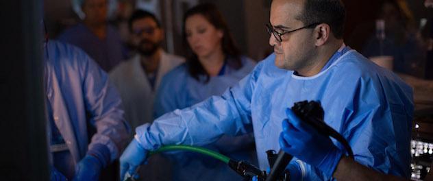 Gastroenterologist at Mayo Clinic demonstrating an investigational device used for research purposes