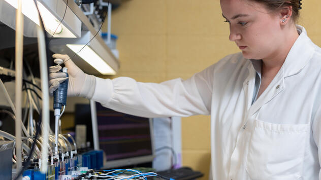 Researcher pipetting