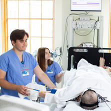 Research team and patient in treatment room